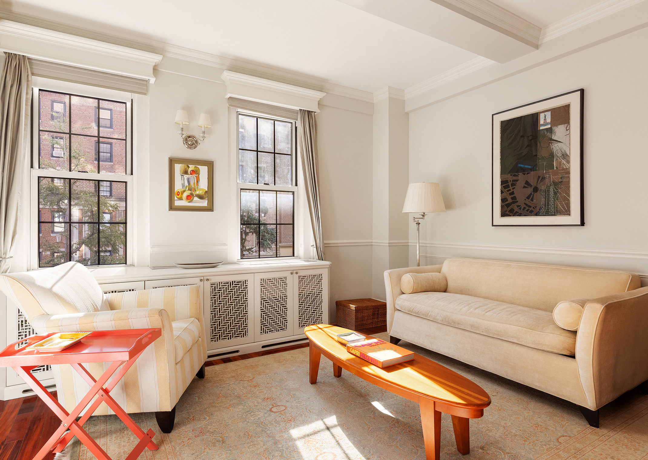 30 5th Avenue, Unit 3H Manhattan, NY 10011 - Photo 1 of 11 a living room with furniture and windows