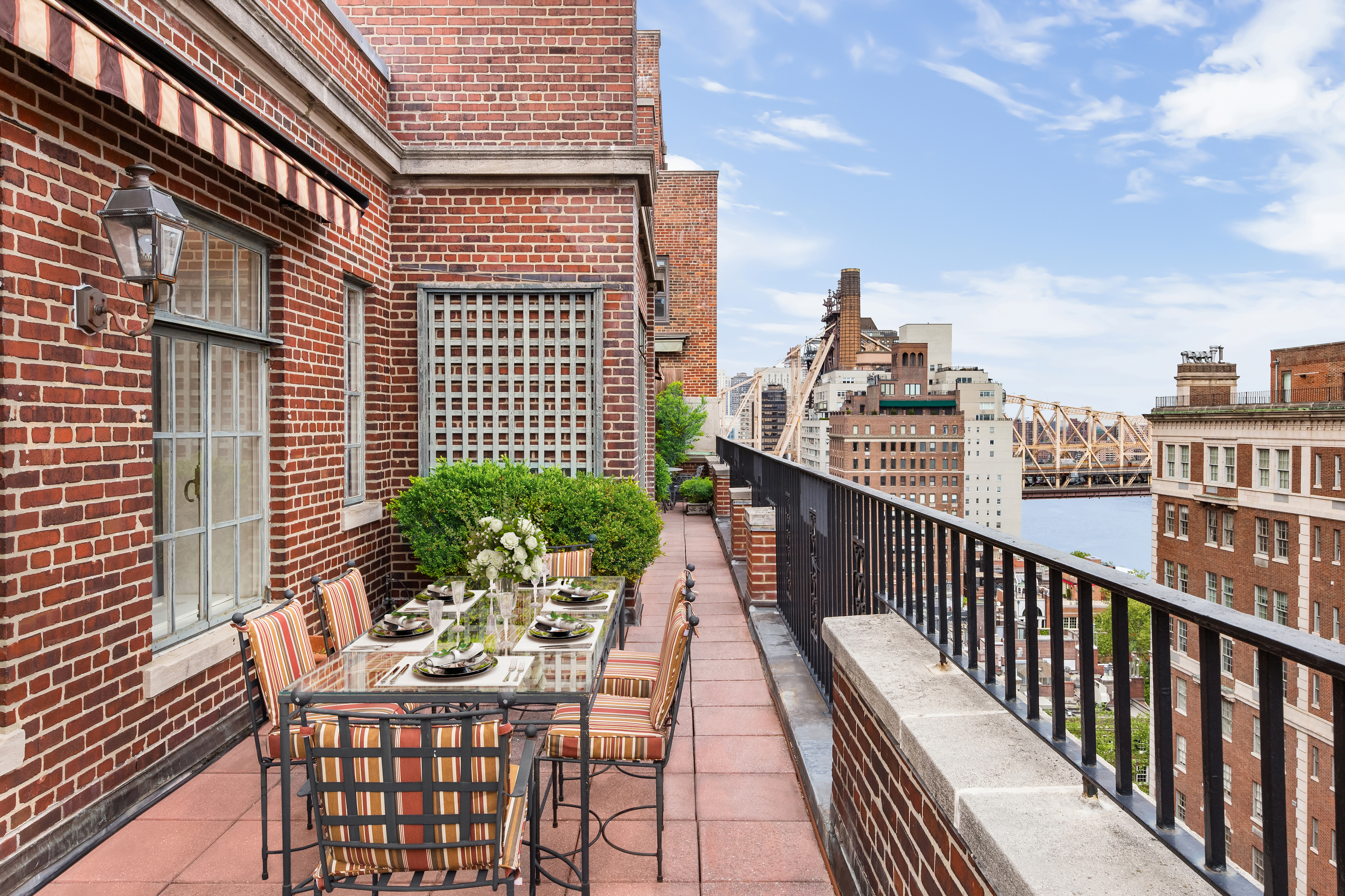14 Sutton Place South, Unit PHA Manhattan, NY 10022 - Photo 18 of 22 a view of a balcony with outdoor seating