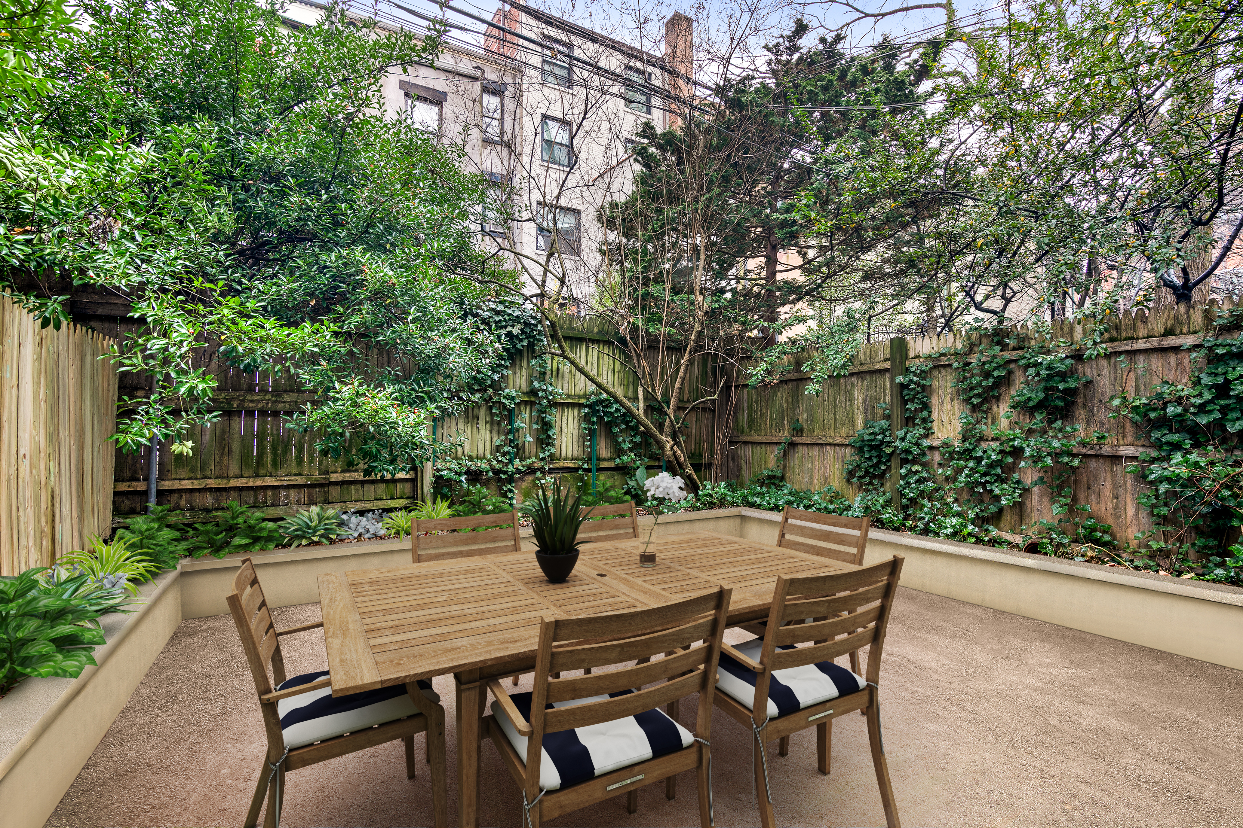 914 President Street, Unit TWNHSE Brooklyn, NY 11215 - Photo 26 of 29 a view of a patio with table and chairs and potted plants
