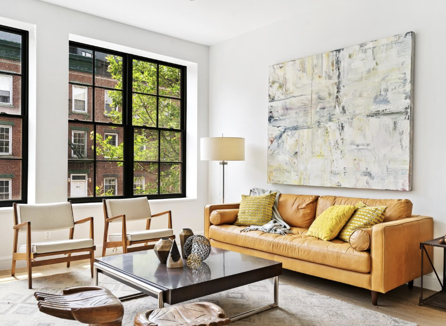 243 North 5th Street, Unit 2B Brooklyn, NY 11211 - Photo 3 of 14 a living room with furniture and a large window
