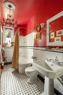 a view of a backyard with large trees