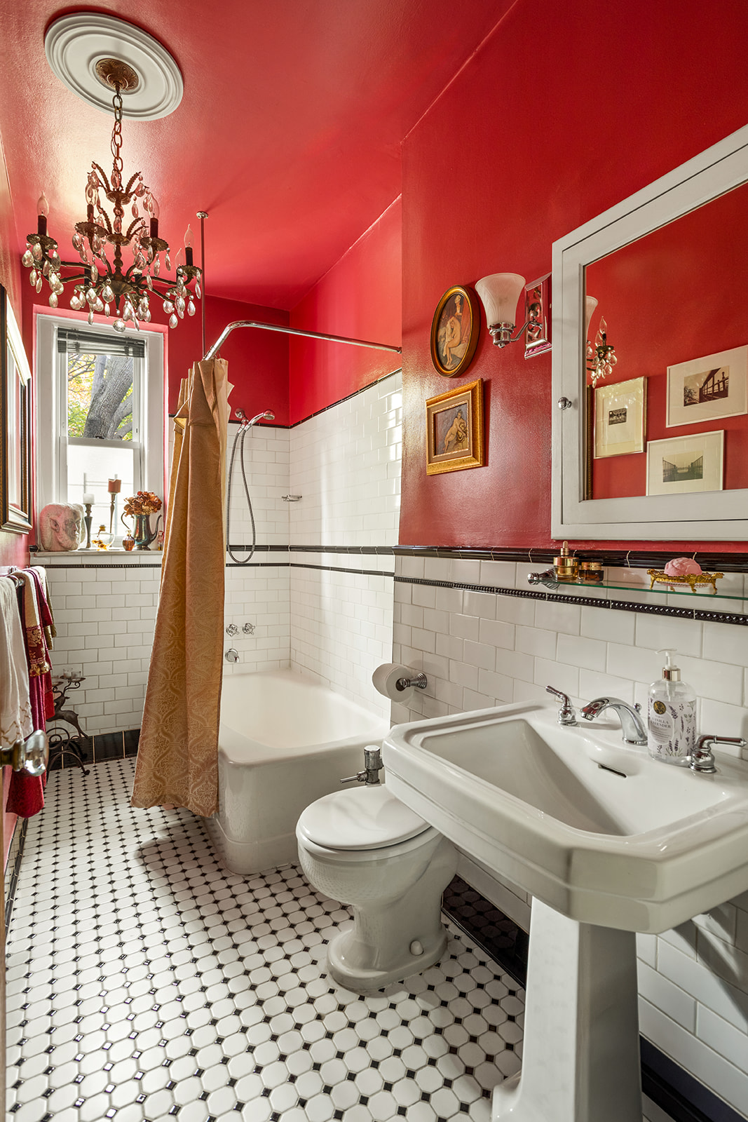 34-27 79th Street, Unit 42 Queens, NY 11372 - Photo 11 of 15 a bathroom with a sink a toilet and a mirror