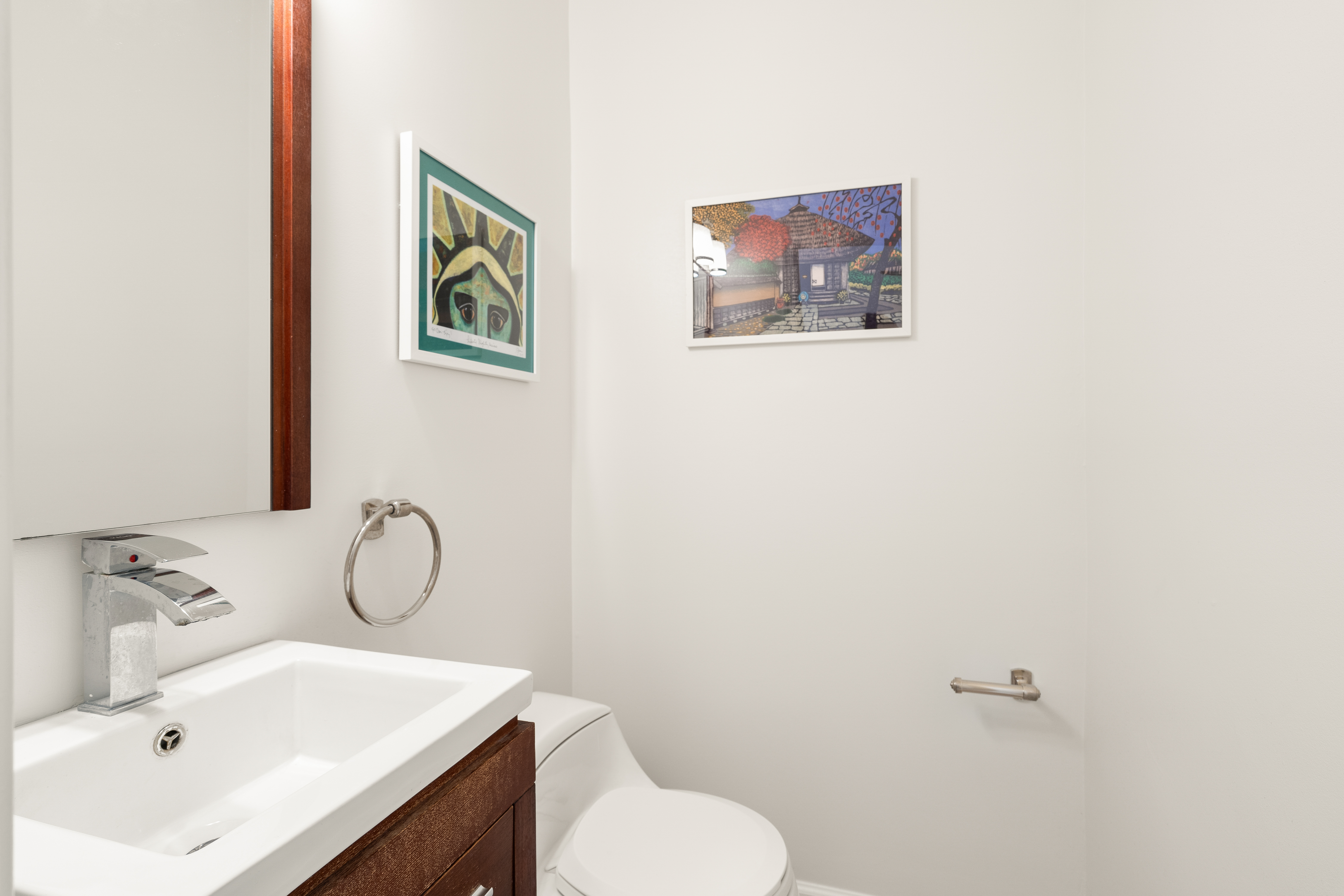 1855 Calvert Street Northwest, Unit 101 Washington, DC 20009 - Photo 11 of 14 a bathroom with a sink mirror and toilet