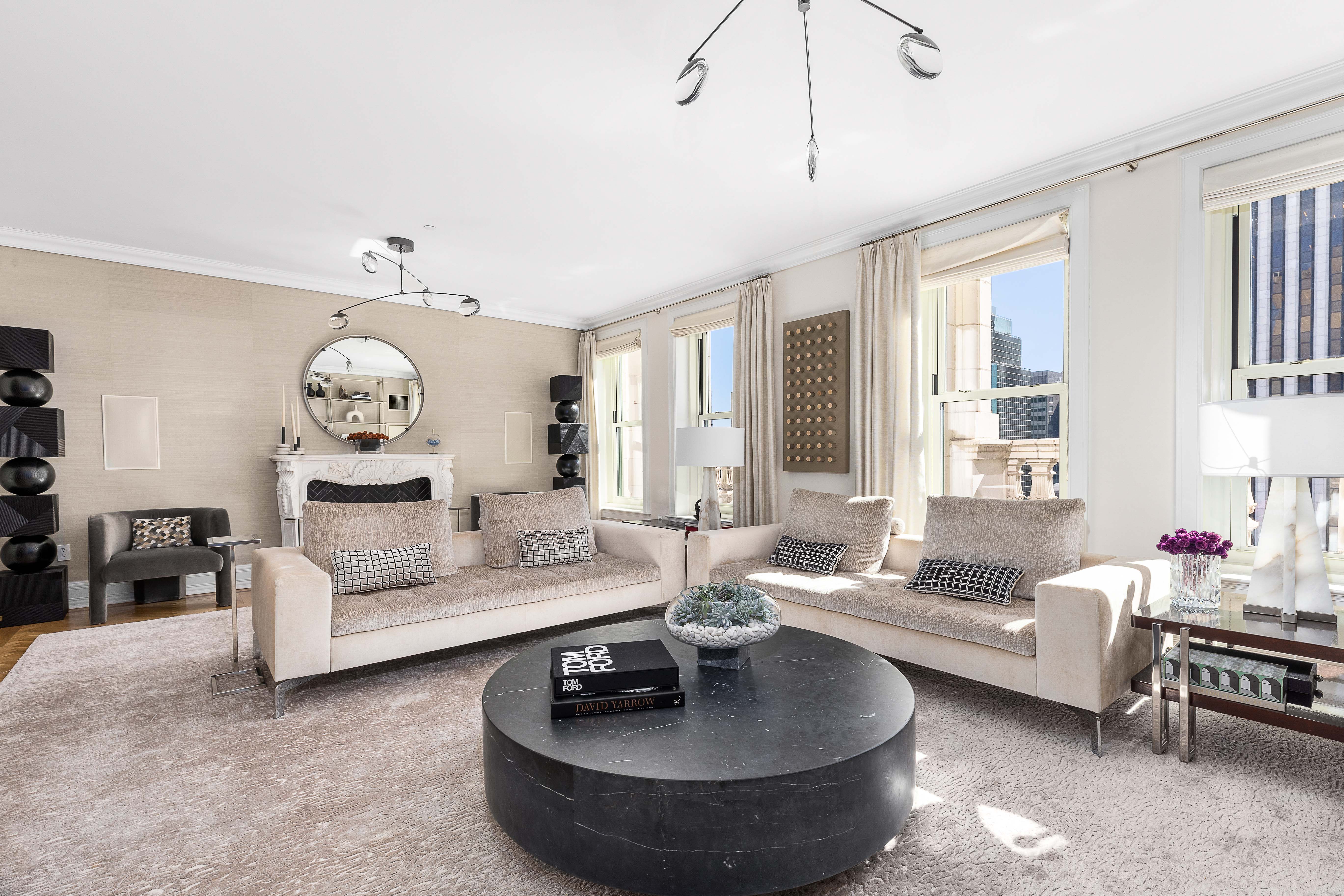 1 Central Park South, Unit 1513 Manhattan, NY 10019 - Photo 3 of 29 a living room with furniture and a large window