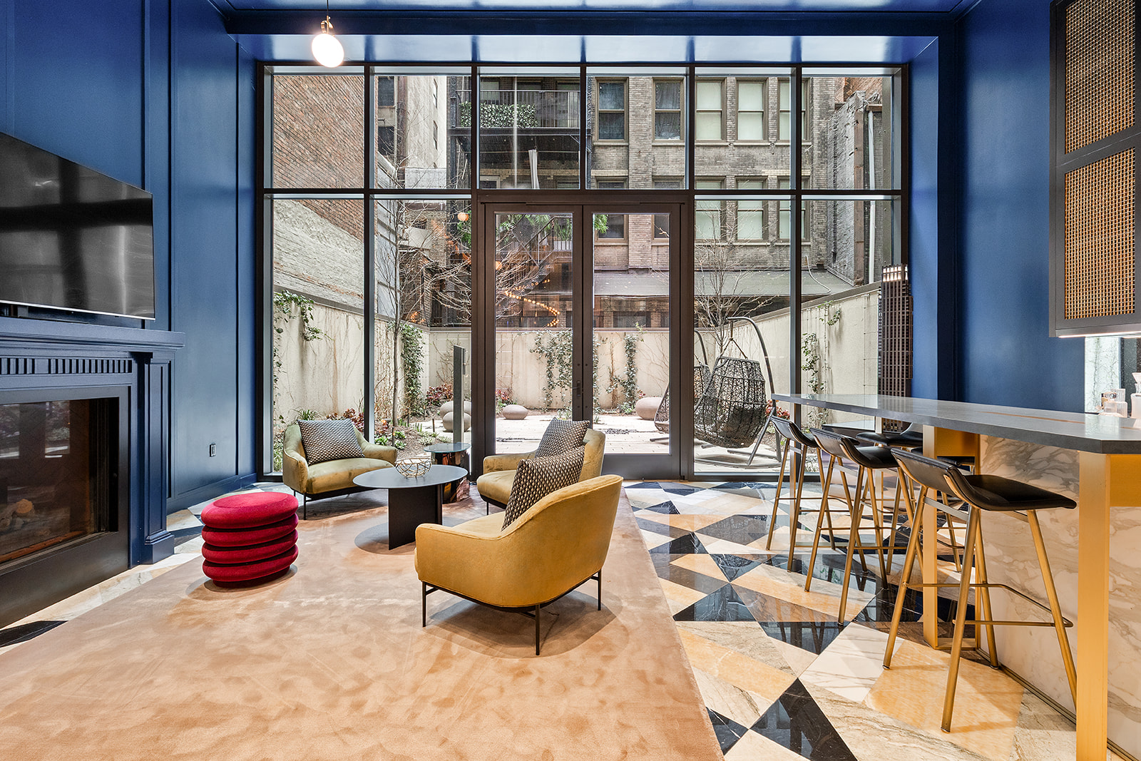 30 East 29th Street, Unit 16A Manhattan, NY 10016 - Photo 11 of 16 a living room with furniture and a fireplace
