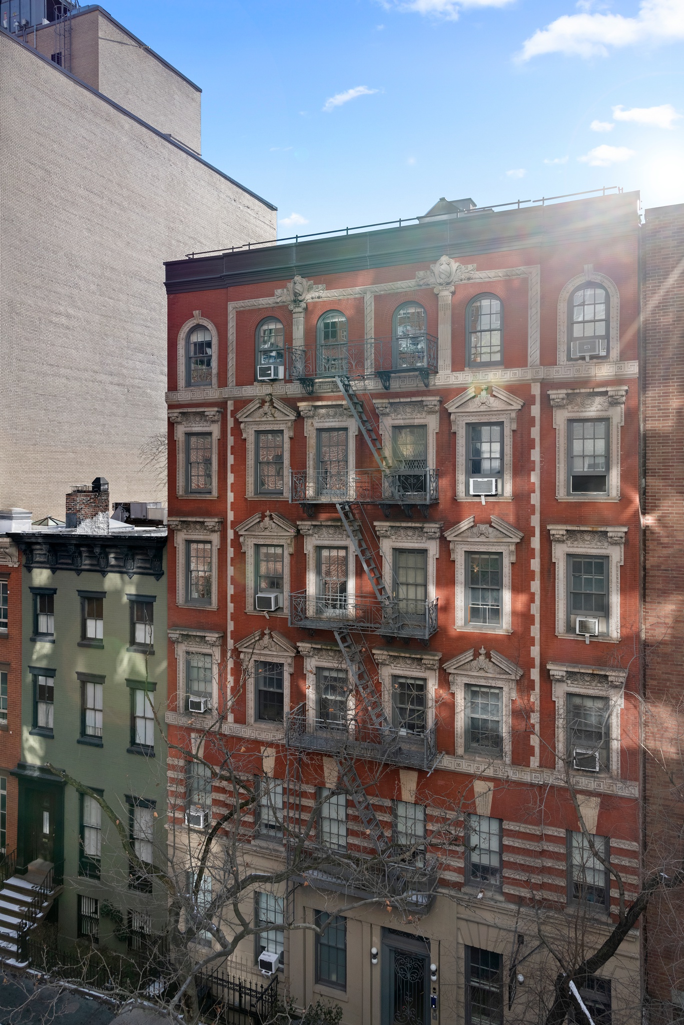 79 West 12th Street, Unit 6BC Manhattan, NY 10011 - Photo 12 of 15 a front view of a building with glass windows and door