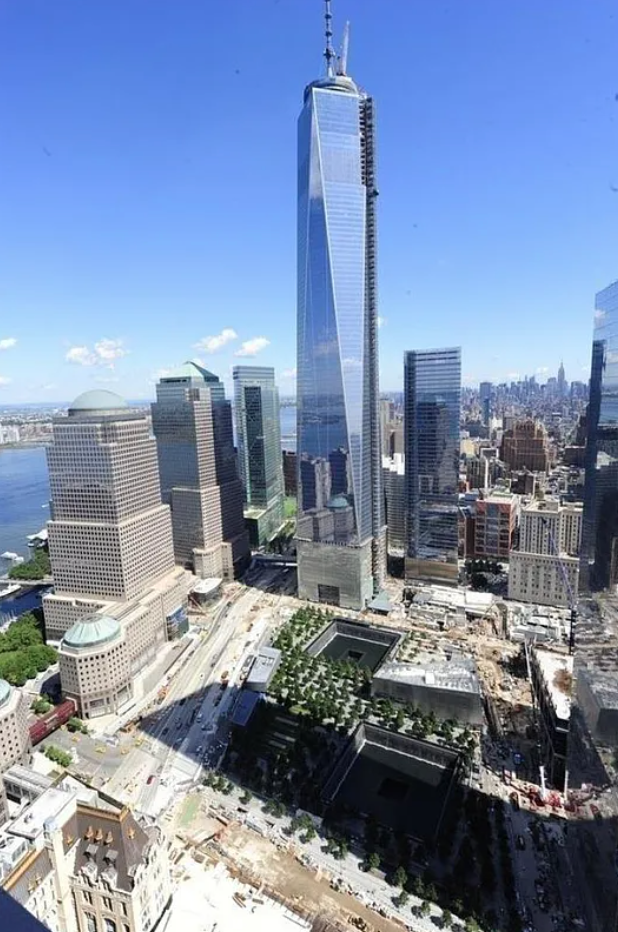123 Washington Street, Unit 43F Manhattan, NY 10006 - Photo 5 of 8 a view of a city with tall buildings