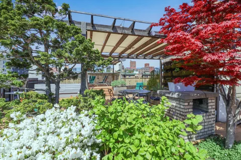 a view of yard with outdoor seating