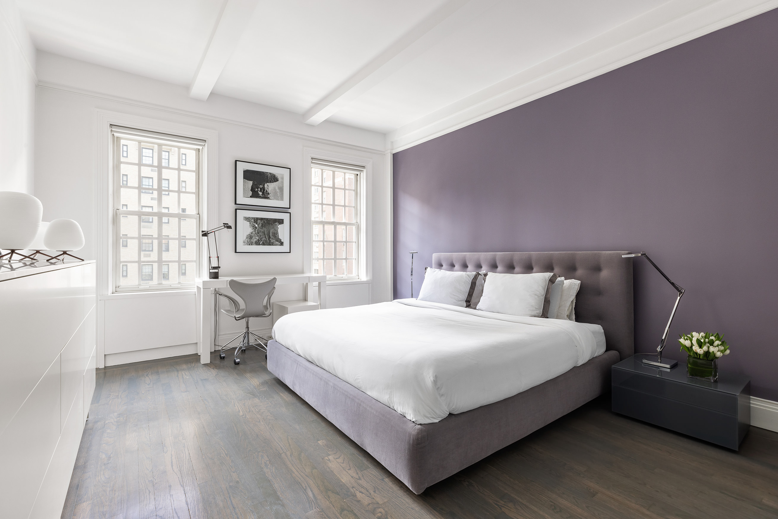 863 Park Avenue, Unit 8W Manhattan, NY 10075 - Photo 6 of 15 a bedroom with a bed table and a window