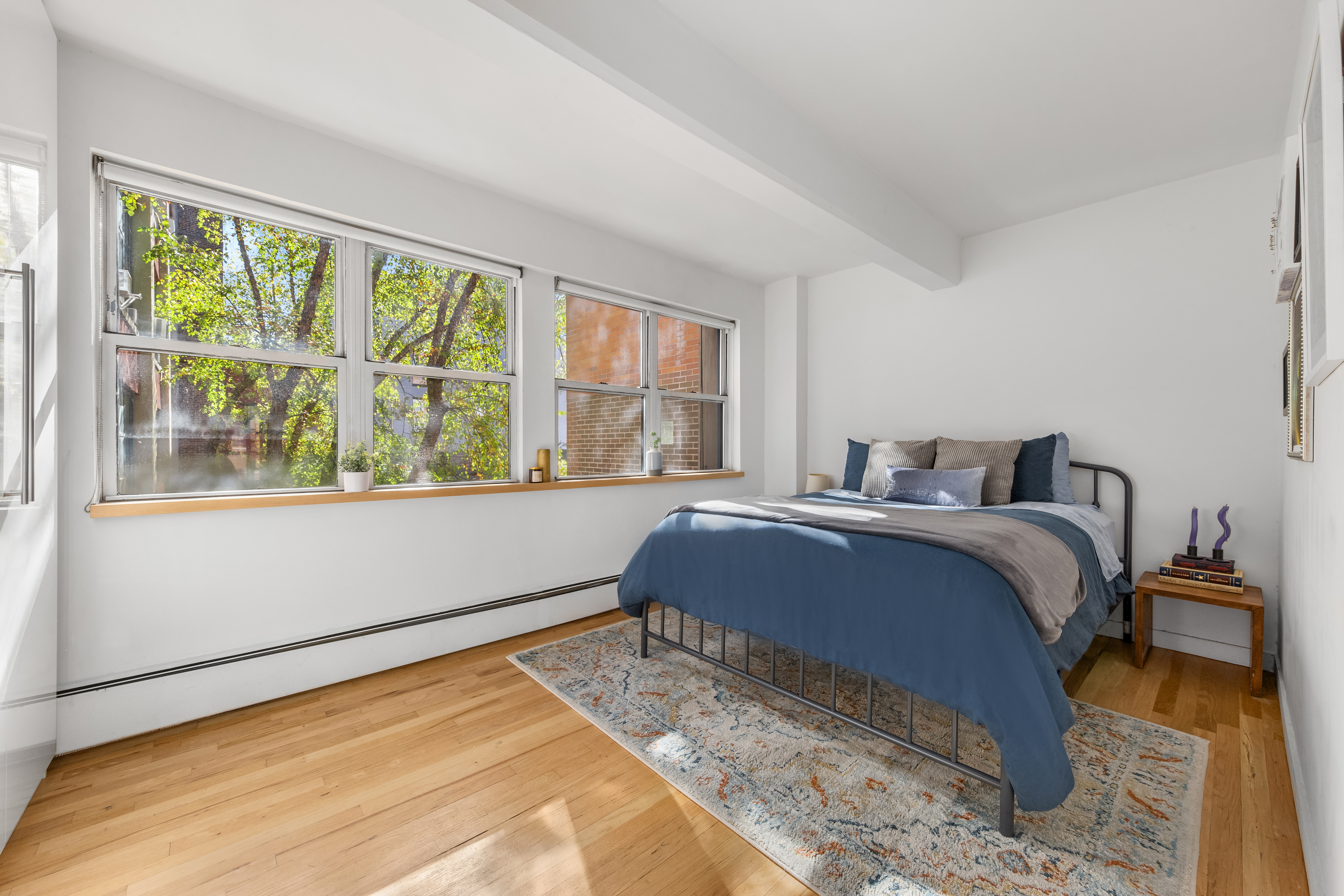 110 Clifton Place, Unit 2A Brooklyn, NY 11238 - Photo 4 of 8 a bedroom with a bed and a window