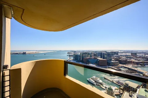 a view of a city from a balcony