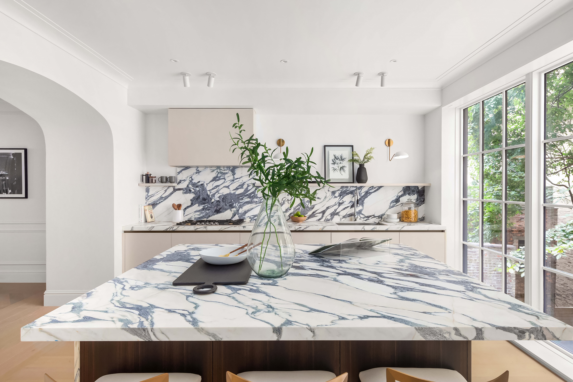 344 West 84th Street, Unit PH Manhattan, NY 10024 - Photo 4 of 11 a living room with a large window and table