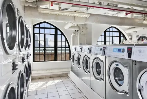 a view of livingroom with washer and dryer