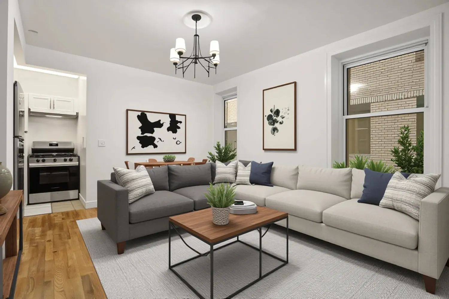 a living room with furniture and a chandelier