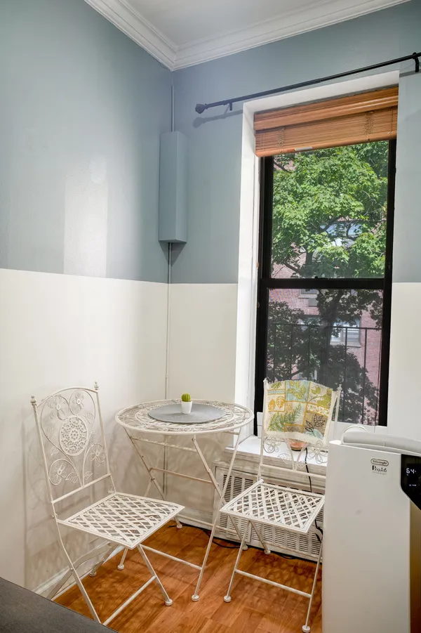 a living room with a couch and a table