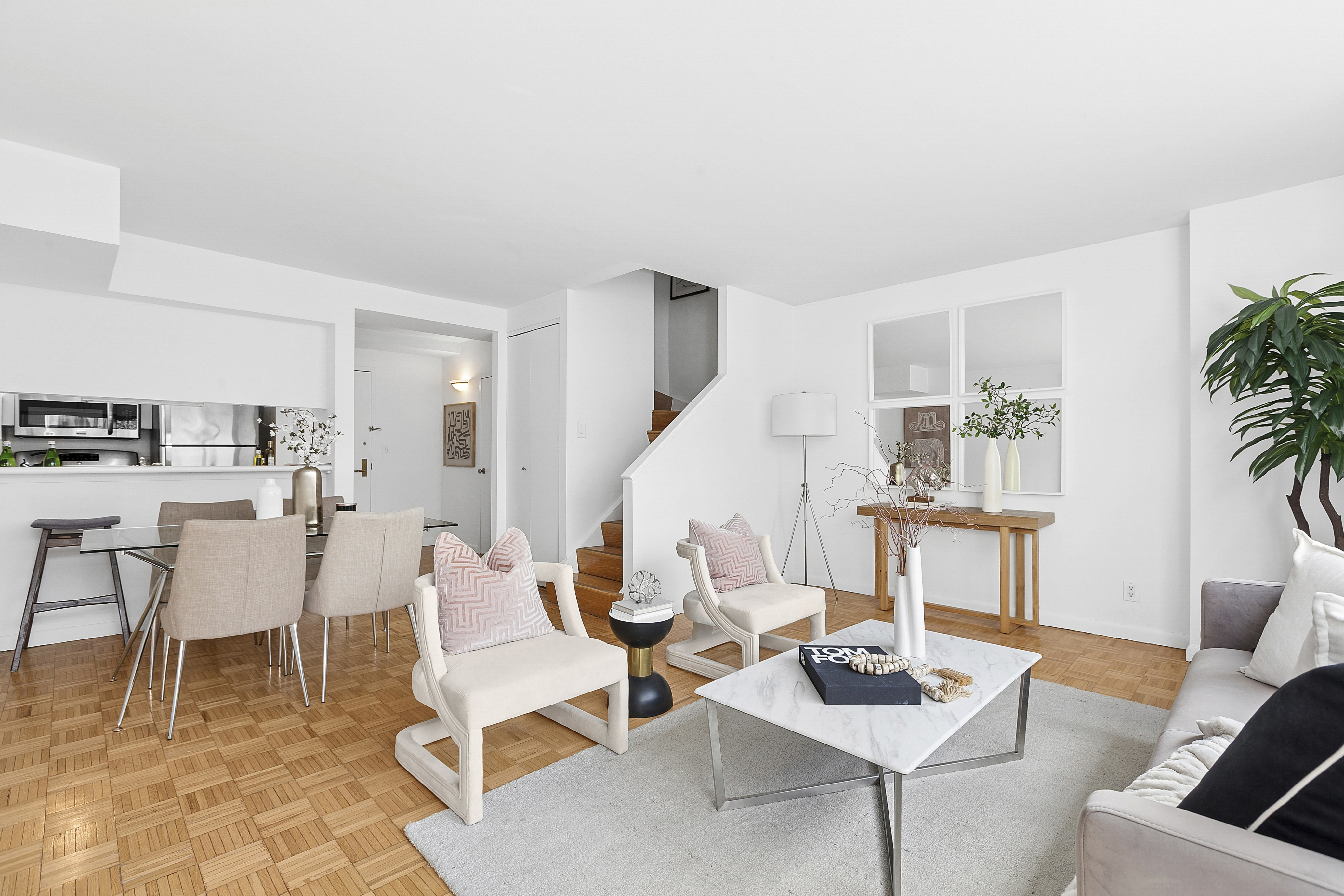 2250 Broadway, Unit 6K Manhattan, NY 10024 - Photo 2 of 13 a living room with furniture and wooden floor