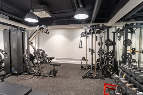 a view of a hallway with washer and dryer