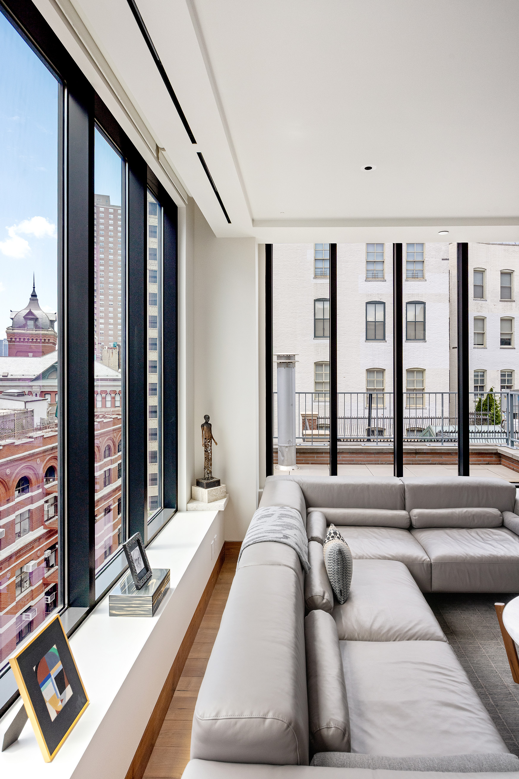 15 Leonard Street, Unit PH Manhattan, NY 10013 - Photo 21 of 37 a view of a living room and a balcony