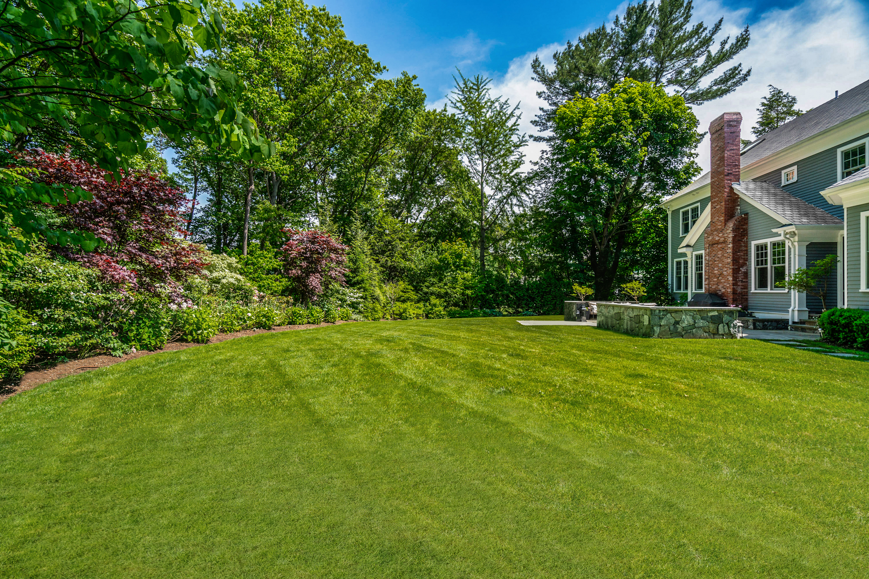 9 Wynnewood Road Wellesley Hills, MA 02481 - Photo 26 of 27 a view of a house with a big yard