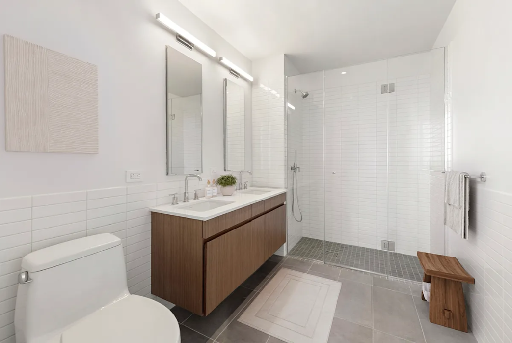 5 South 5th Street, Unit 5300 Brooklyn, NY 11249 - Photo 7 of 28 a bathroom with a sink and a mirror