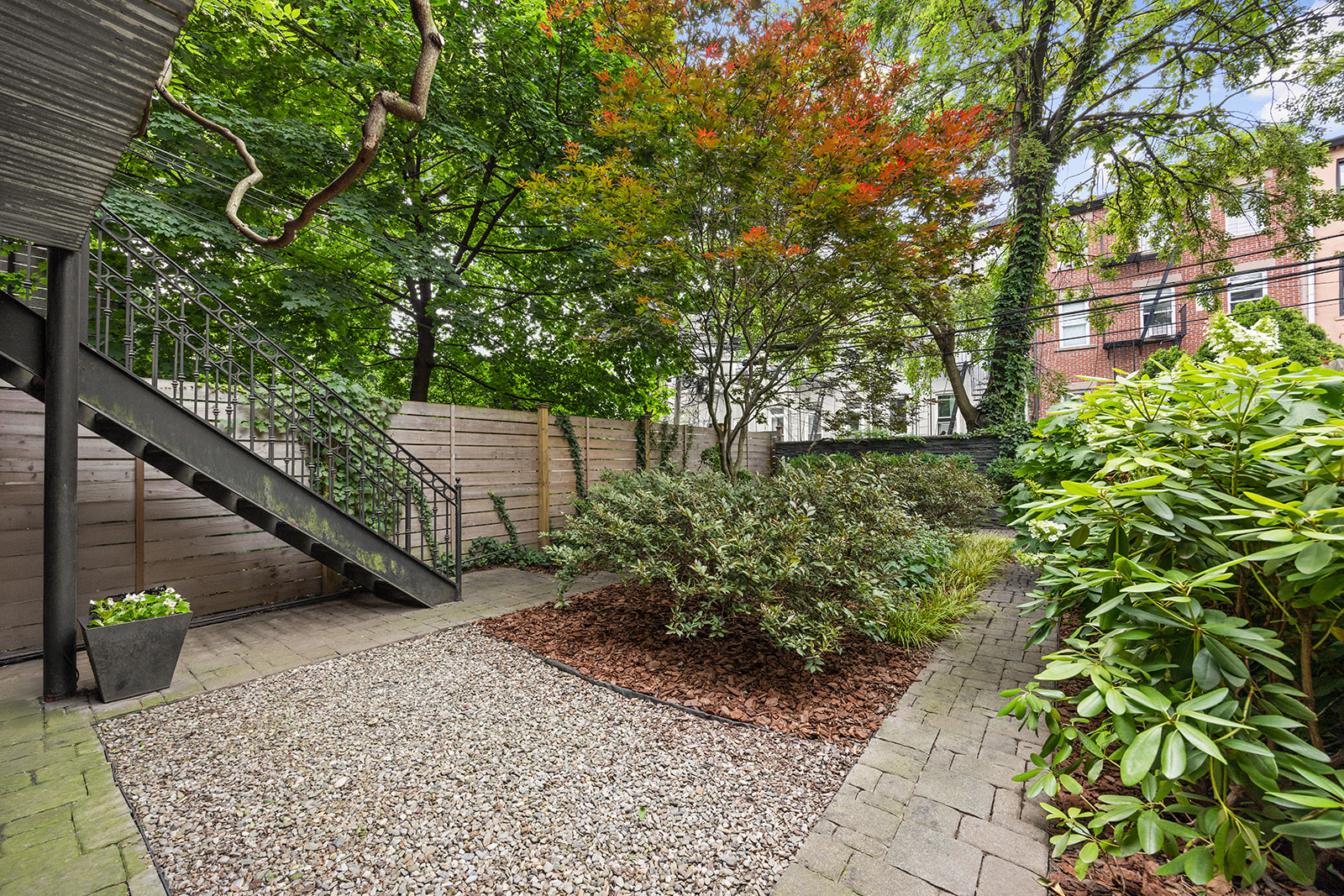 54 Cheever Place Brooklyn, NY 11231 - Photo 8 of 25 a view of a garden with plants and large trees