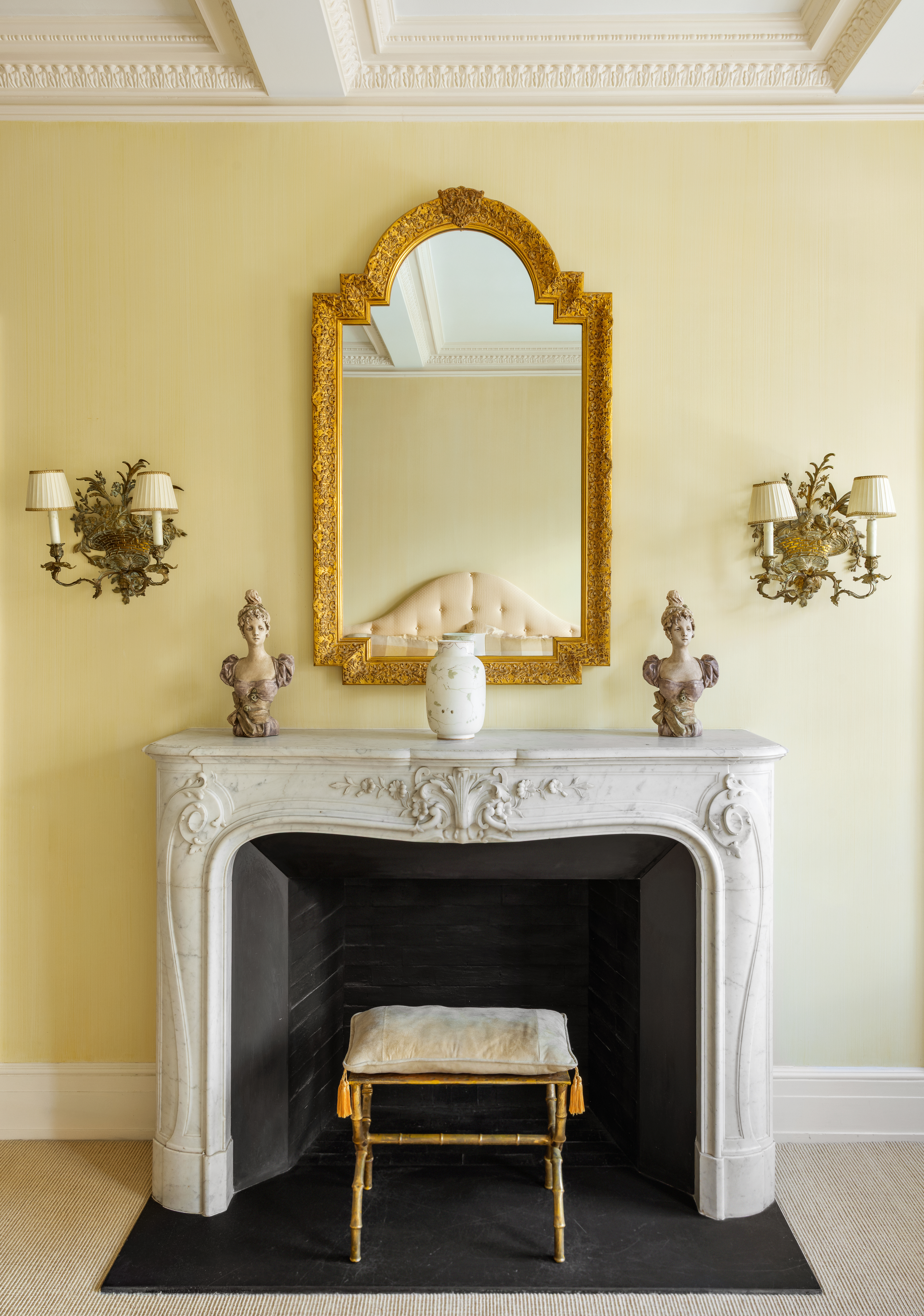 14 East 75th Street, Unit 10C Manhattan, NY 10021 - Photo 5 of 16 a view of fireplace with washer and mirror