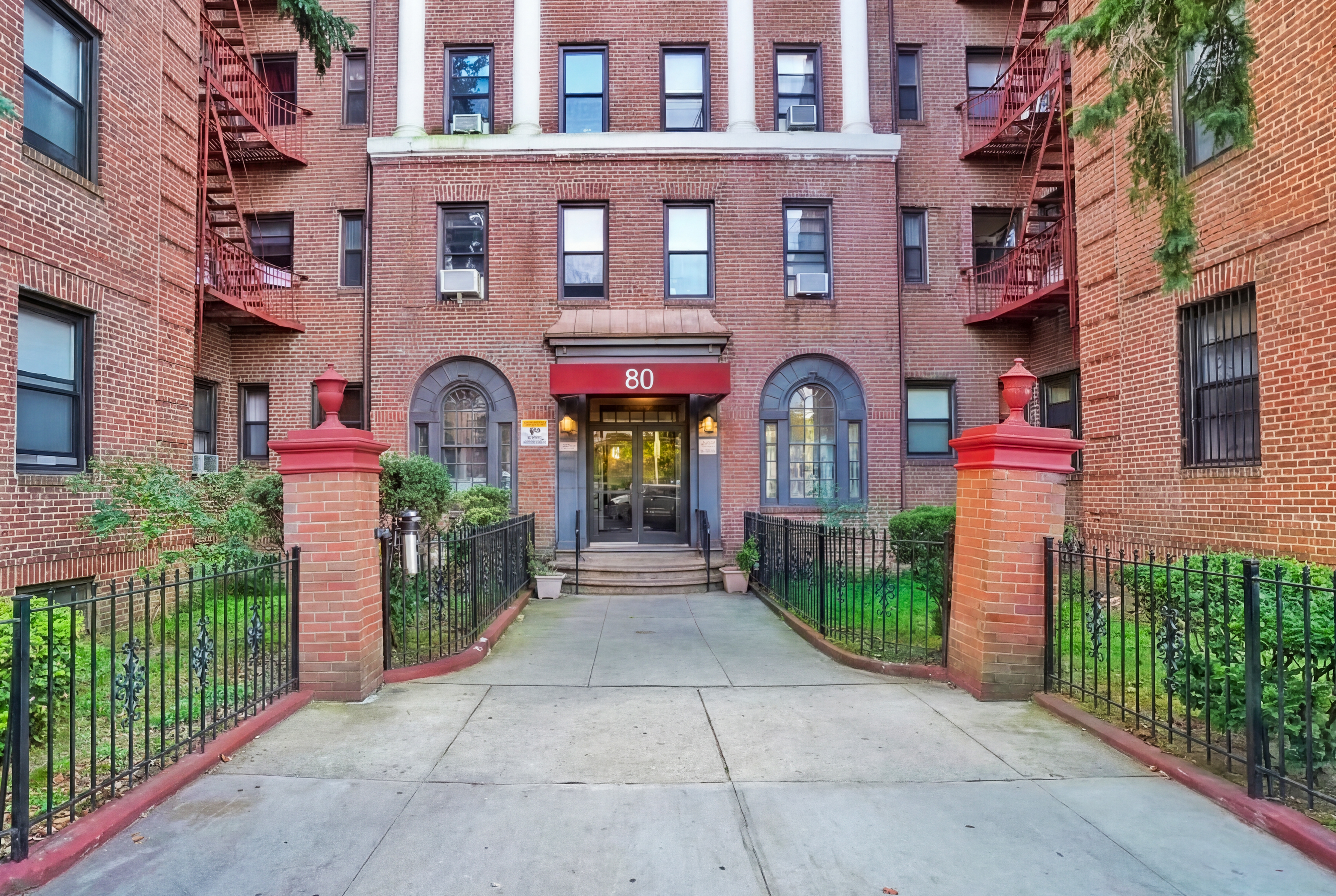 80 Avenue P, Unit D14 Brooklyn, NY 11204 - Photo 18 of 19 a front view of multiple houses