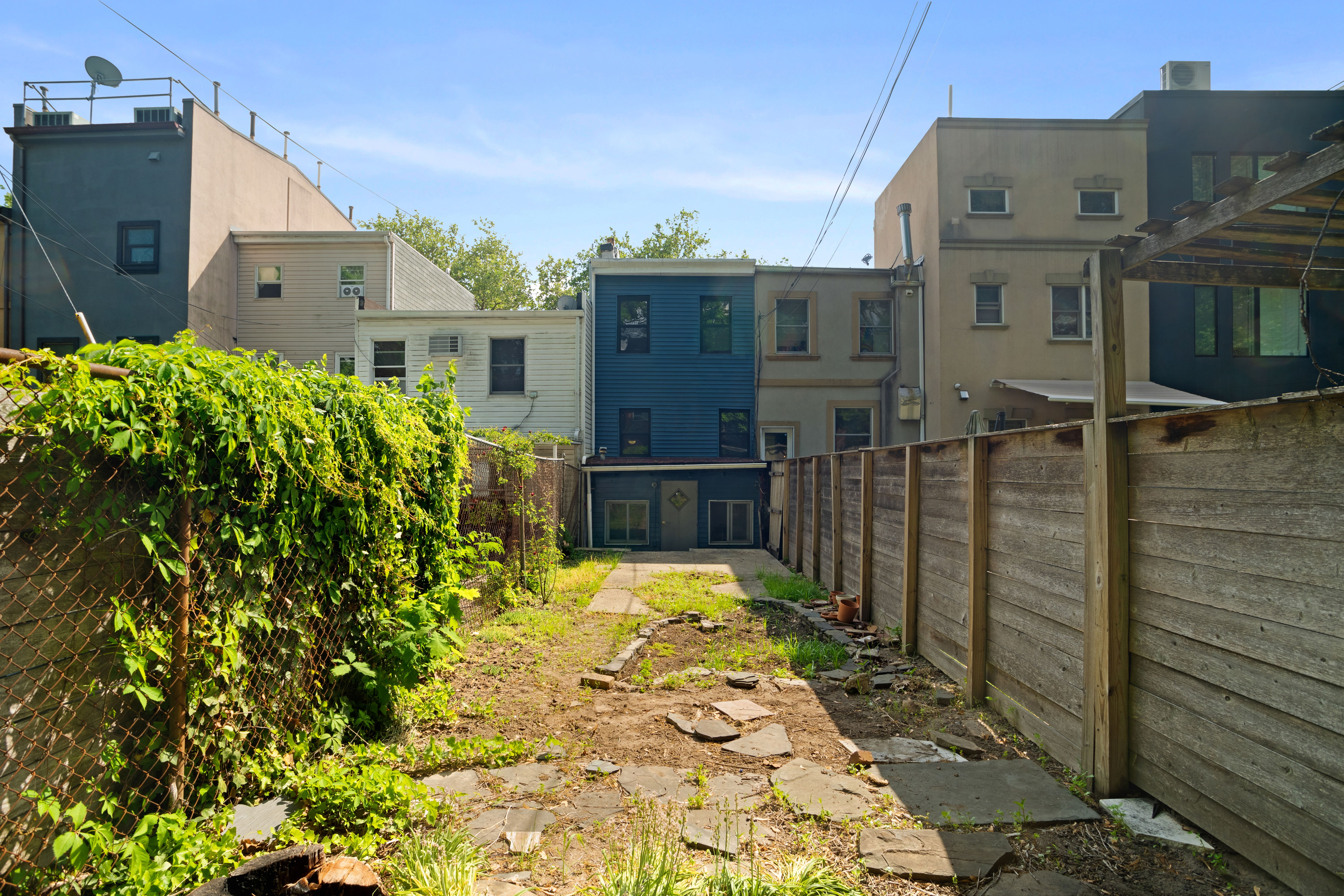 417 A 18th Street Brooklyn, NY 11215 - Photo 14 of 16 a view of a house with many windows