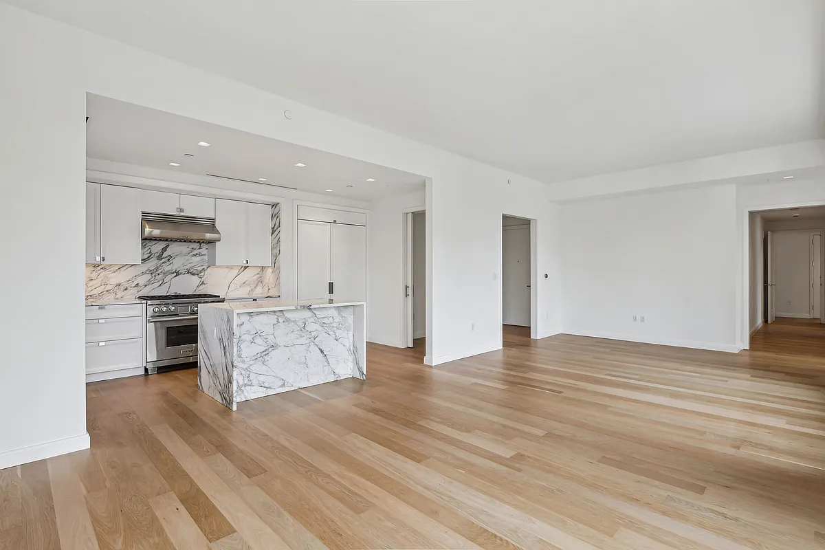 269 West 87th Street, Unit 14A Manhattan, NY 10024 - Photo 3 of 23 a view of a kitchen with wooden floor
