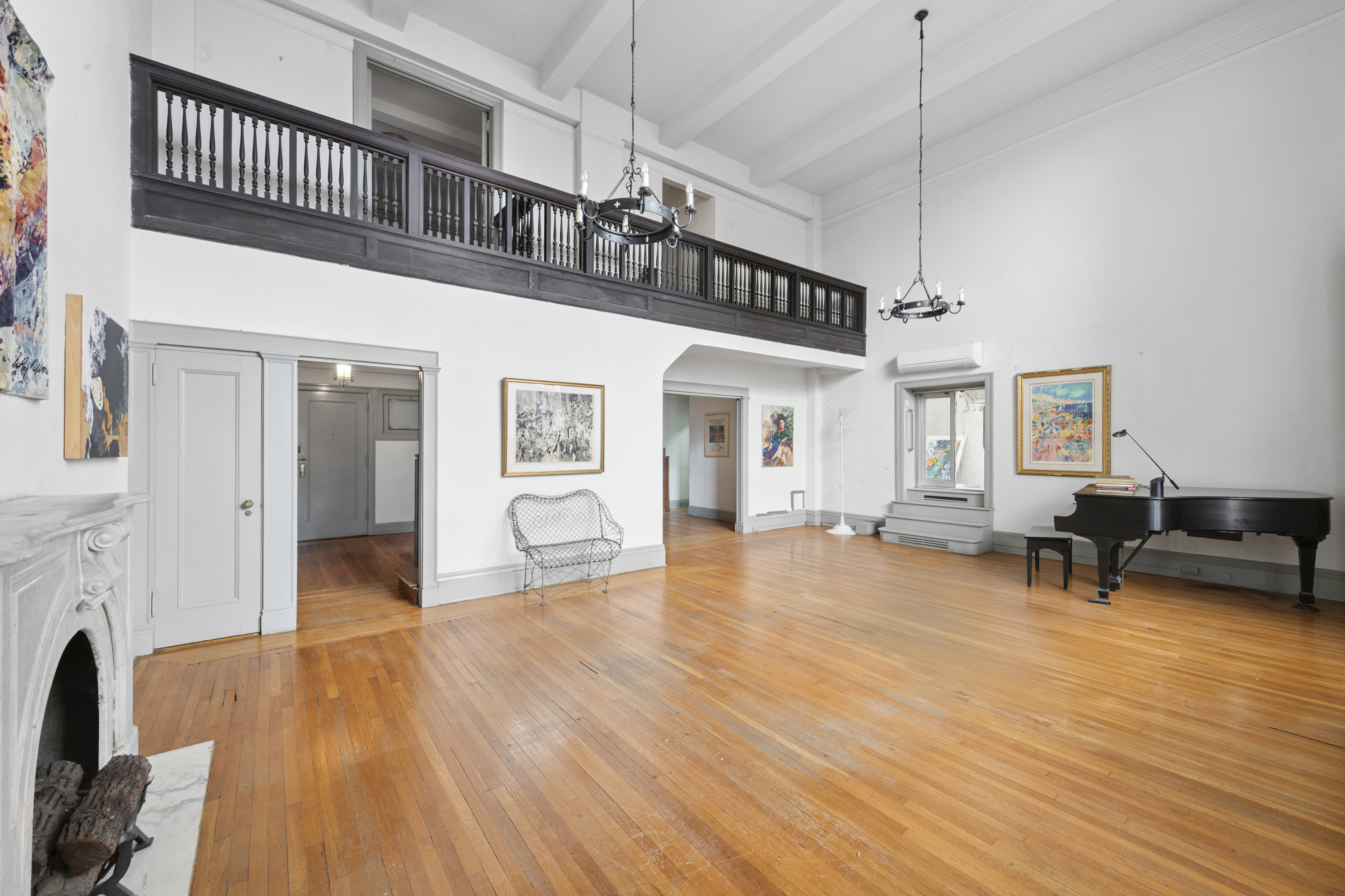 1 West 67th Street, Unit 303-304 Manhattan, NY 10023 - Photo 2 of 18 a view of livingroom with furniture and a ceiling fan