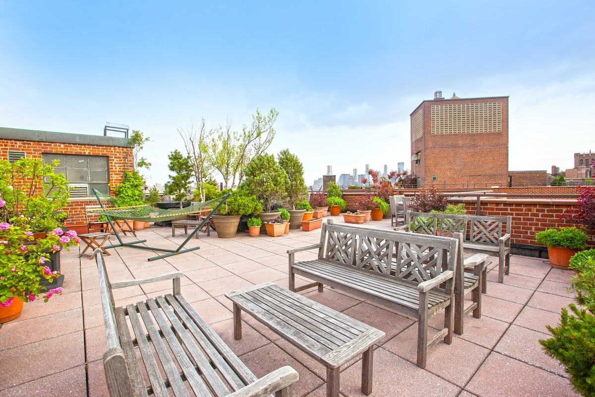 14 Horatio Street, Unit 11F Manhattan, NY 10014 - Photo 11 of 16 a view of a terrace with furniture