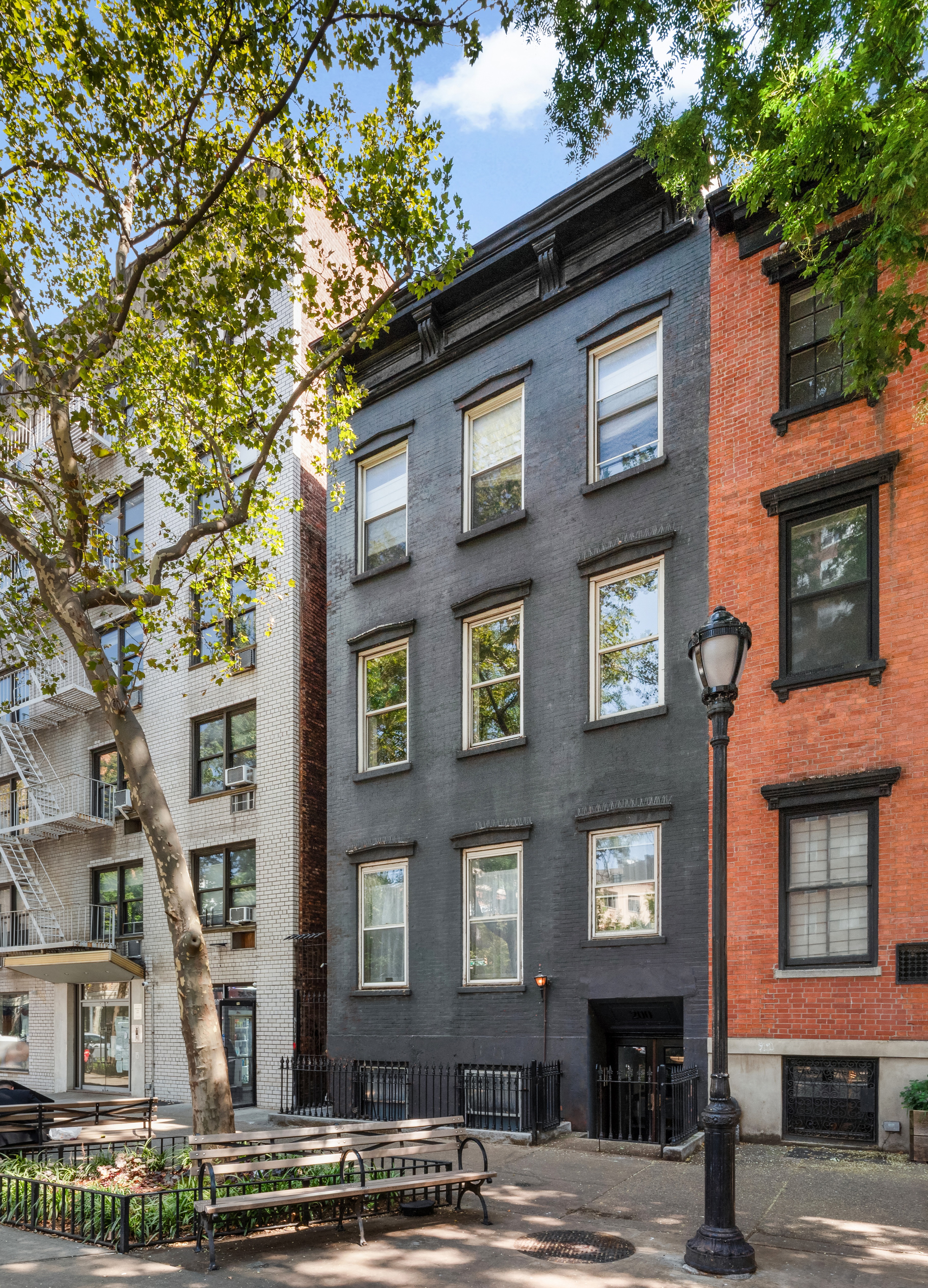 a front view of a building with street view