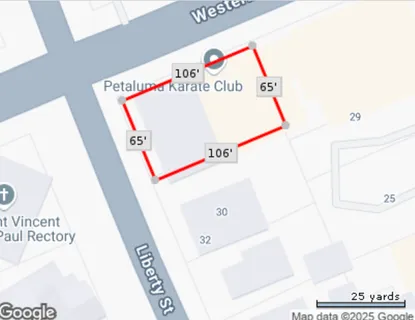 a front view of a building with parking space