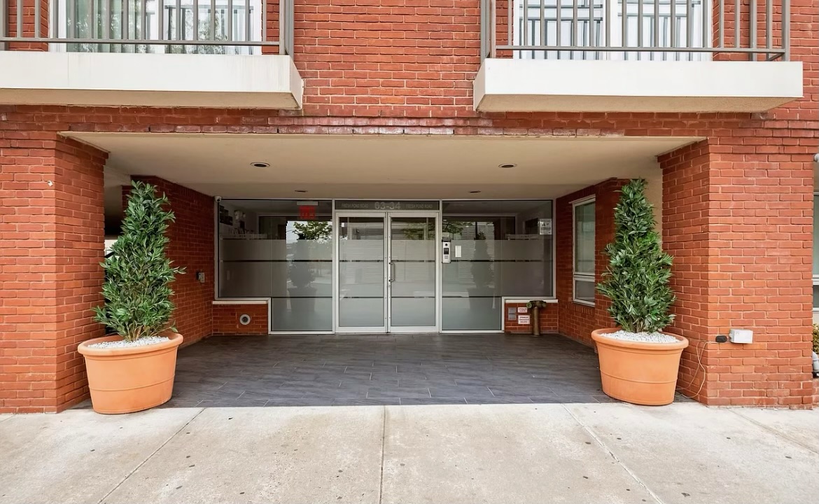 63-34 Fresh Pond Road, Unit 3D Queens, NY 11385 - Photo 13 of 14 a view of a potted plant in front of a house