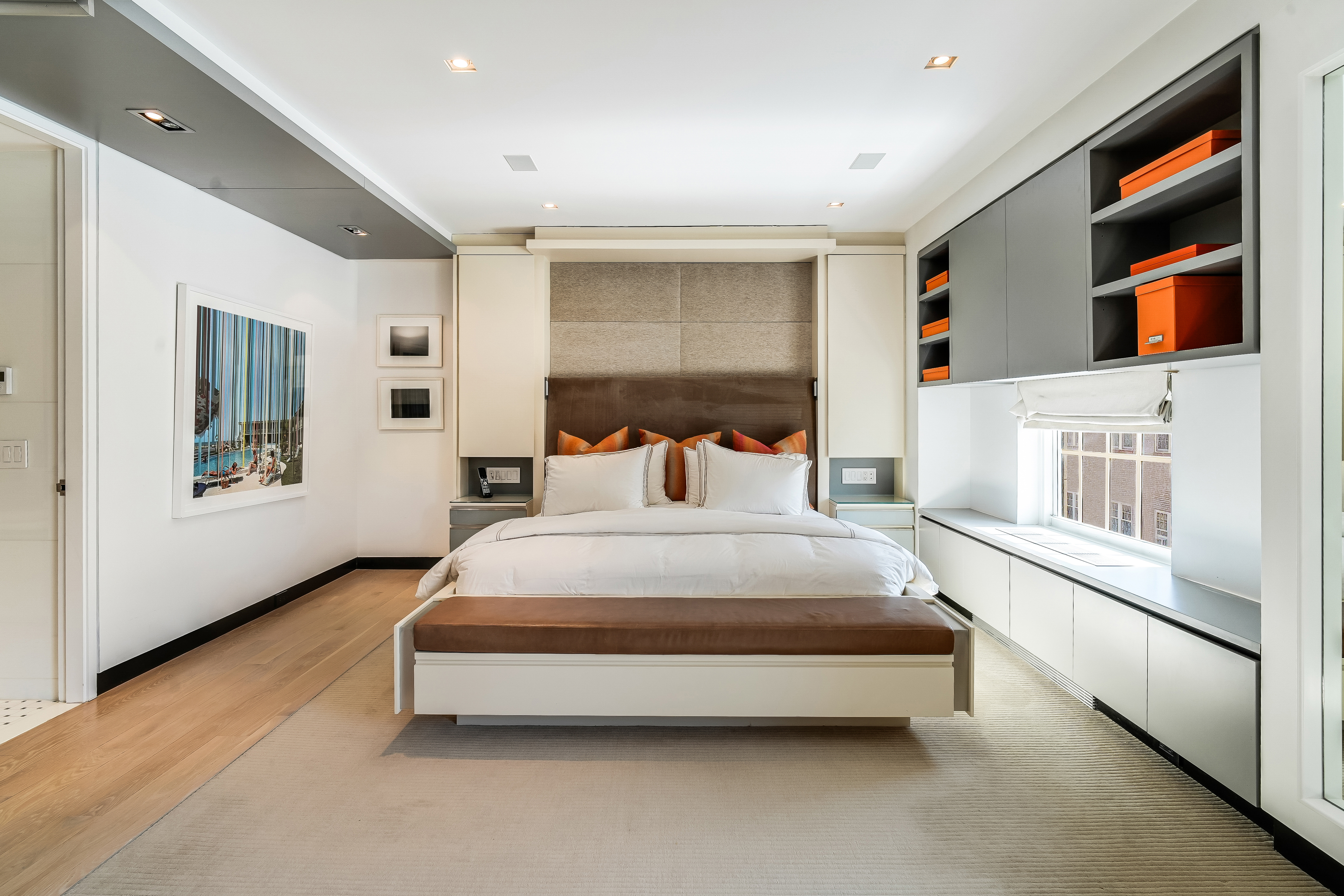 1 5th Avenue, Unit 5GH Manhattan, NY 10003 - Photo 13 of 26 a spacious bedroom with a bed and a window