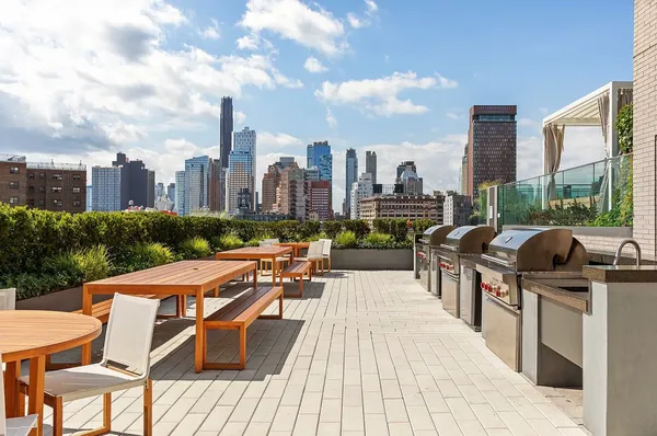 a view of a patio with swimming pool