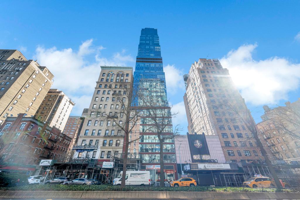 2628 Broadway, Unit 15B Manhattan, NY 10025 - Photo 16 of 21 a view of a city with tall buildings