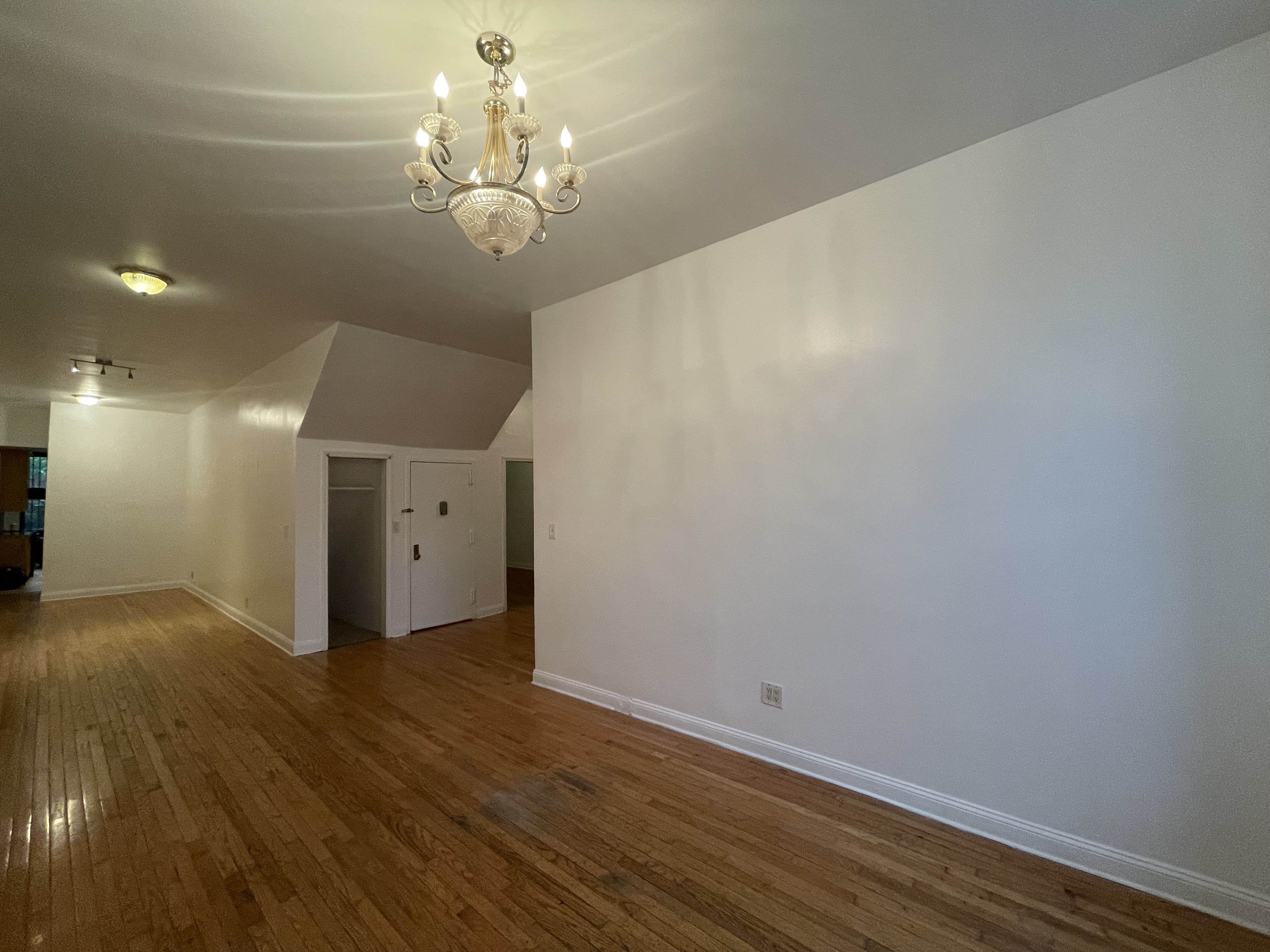 1501 Broadway, Unit 2 Brooklyn, NY 11221 - Photo 2 of 4 a view of a chandelier in big room