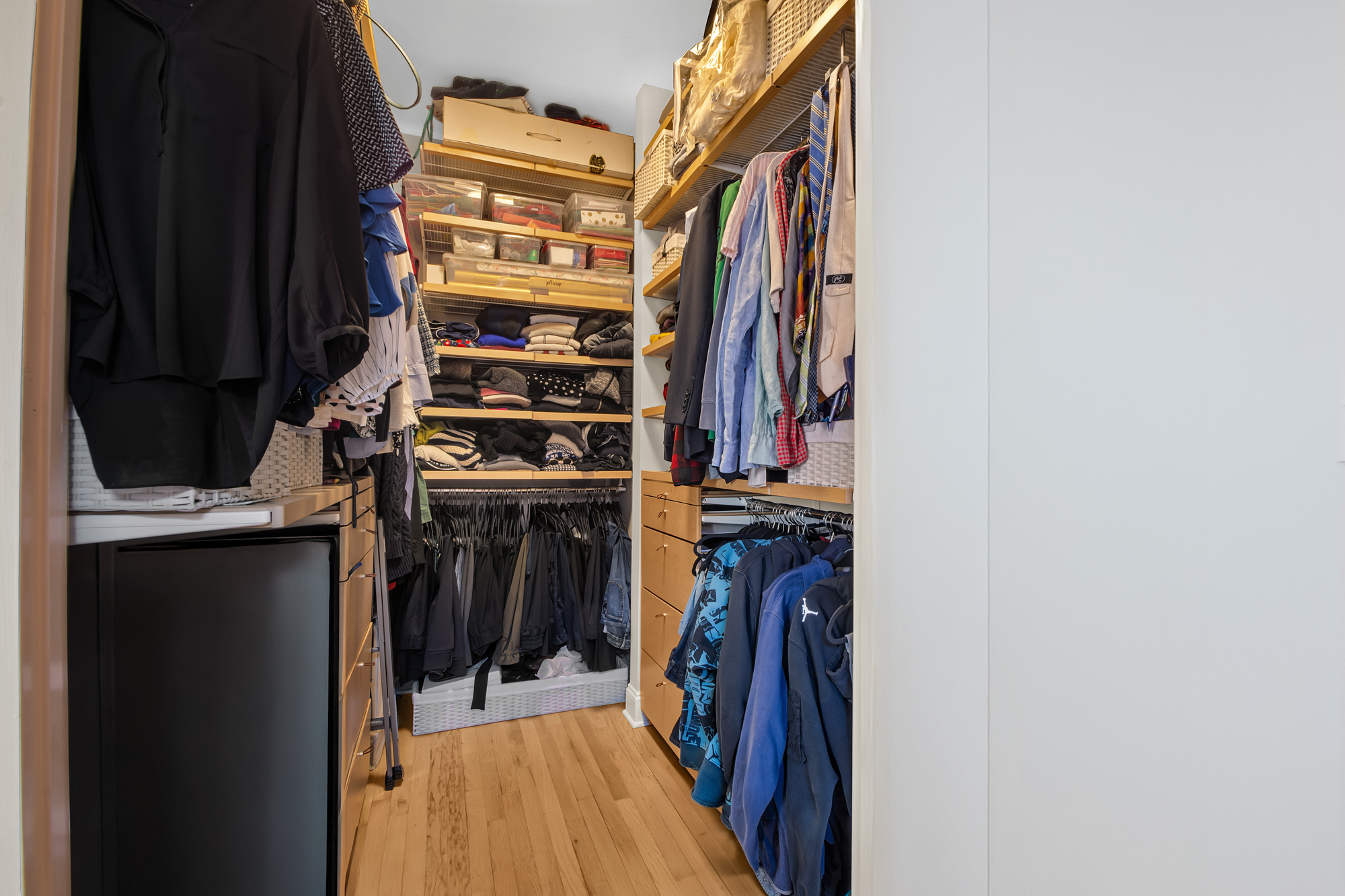 8 Mt Morris Park West, Unit C Manhattan, NY 10027 - Photo 9 of 12 a view of walk in closet with clothes and shoes