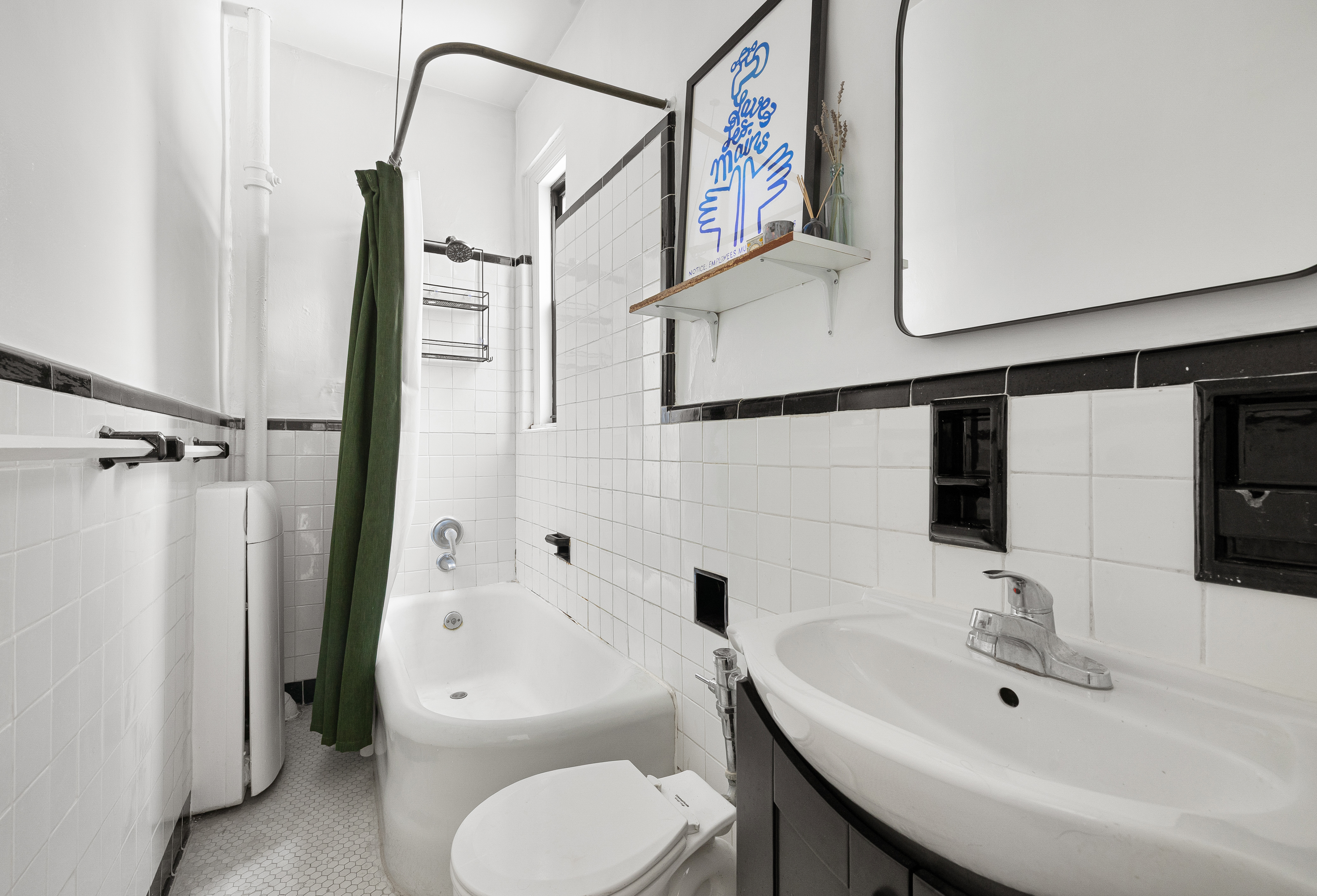 78 8th Avenue, Unit 2K Brooklyn, NY 11215 - Photo 7 of 10 a bathroom with a sink toilet and shower
