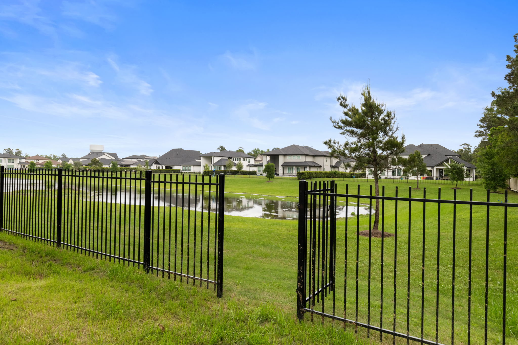 2118 Bennet Court Conroe, TX 77384 - Photo 67 of 70 a view of a balcony with lake view