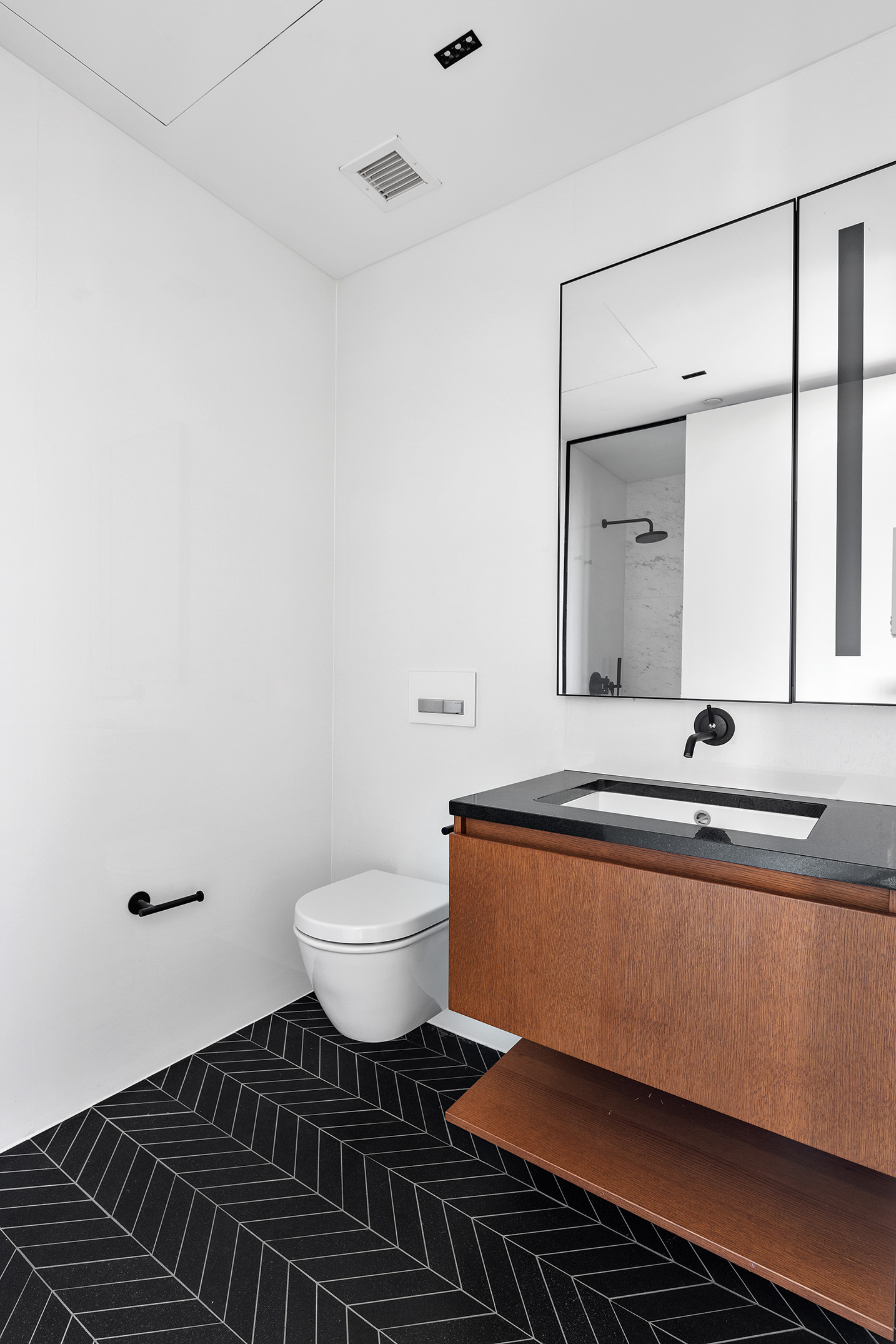 570 Broome Street, Unit PHA Manhattan, NY 10013 - Photo 19 of 22 a bathroom with a toilet a sink and mirror