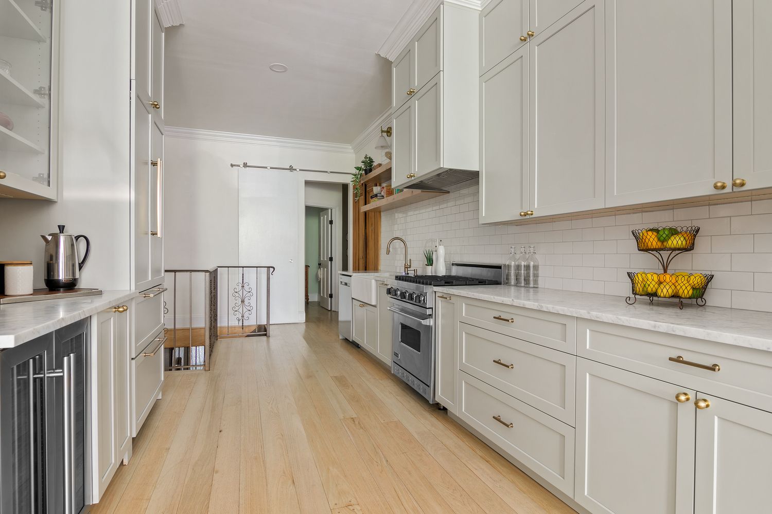 a kitchen with stainless steel appliances granite countertop a lot of counter top space and cabinets