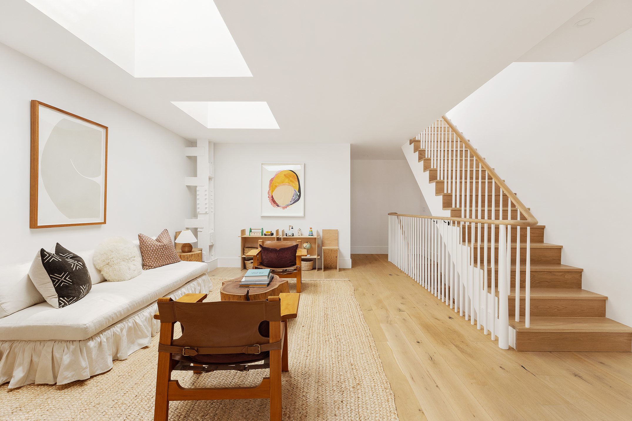 524 Halsey Street, Unit TH1 Brooklyn, NY 11233 - Photo 8 of 17 a living room with furniture and wooden floor