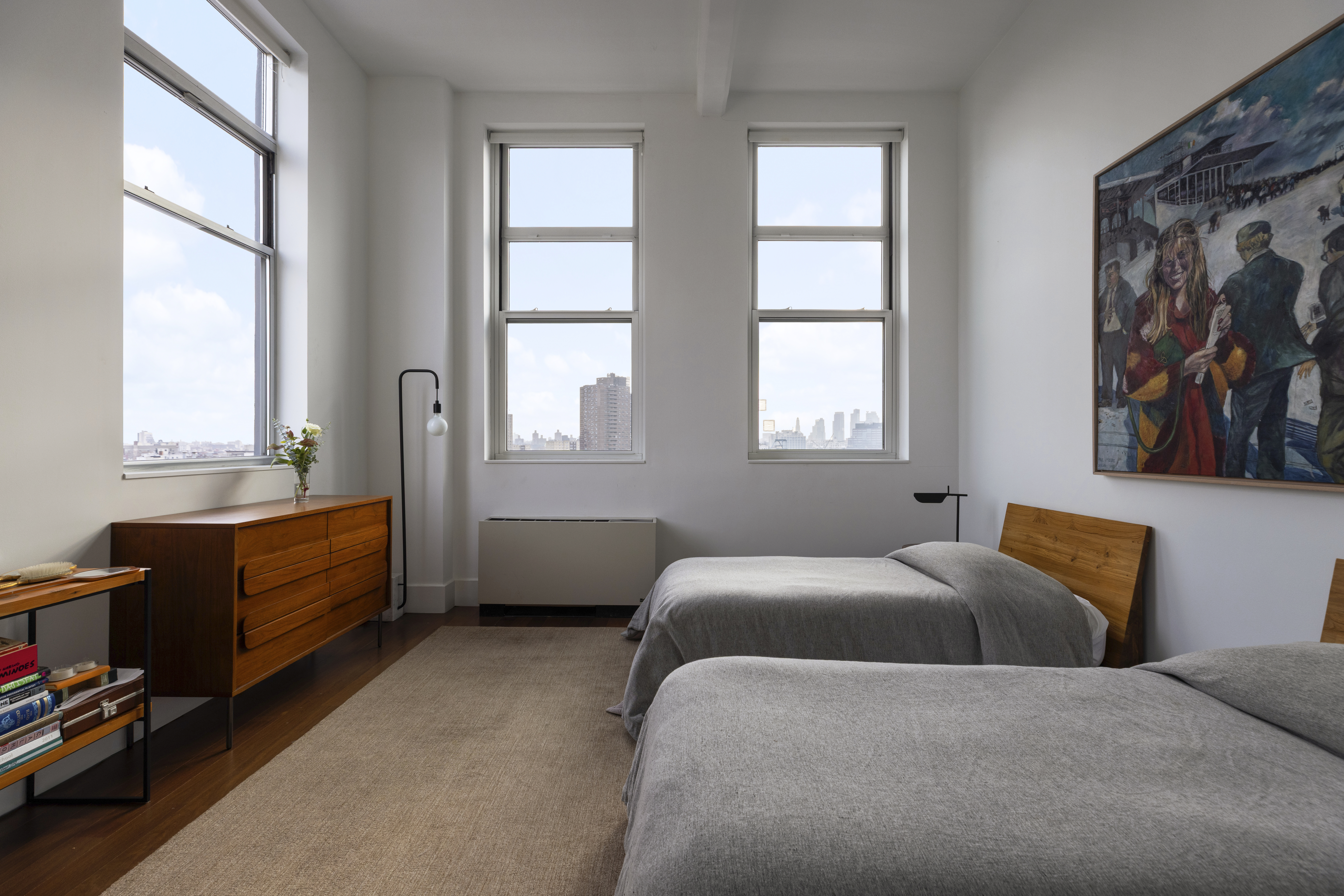 60 Broadway, Unit 8K Brooklyn, NY 11249 - Photo 7 of 10 a bedroom with furniture and a window