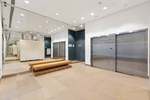 a picture of a bench in a white building