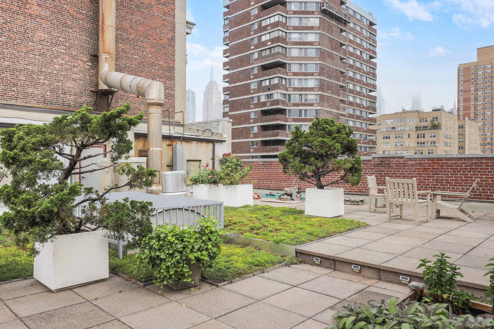 310 East 23rd Street, Unit 2B Manhattan, NY 10010 - Photo 6 of 7 a view of a multi story building