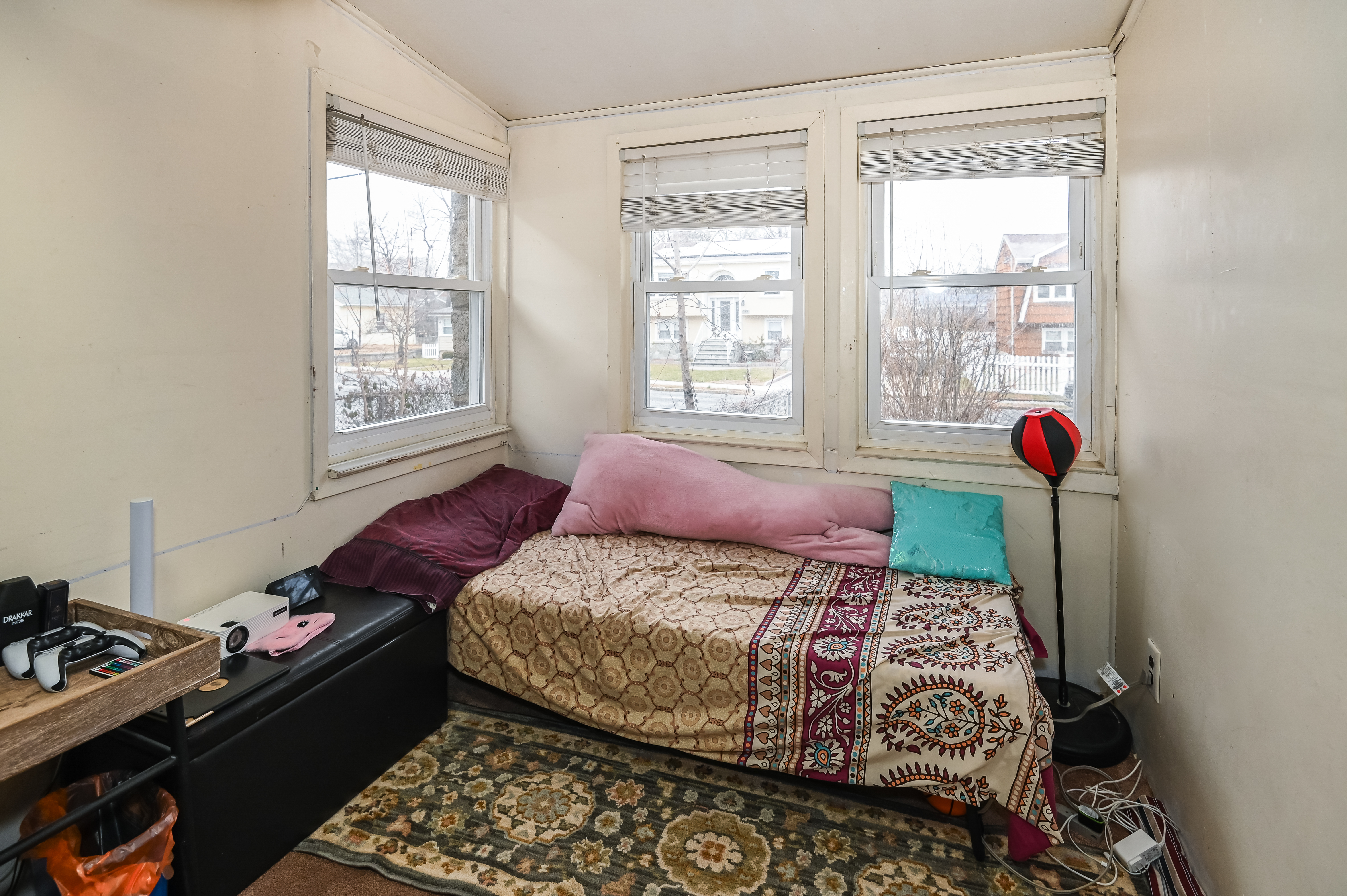 137 Hiawatha Boulevard Lake Hiawatha, NJ 07034 - Photo 20 of 21 a bedroom with a bed and a window