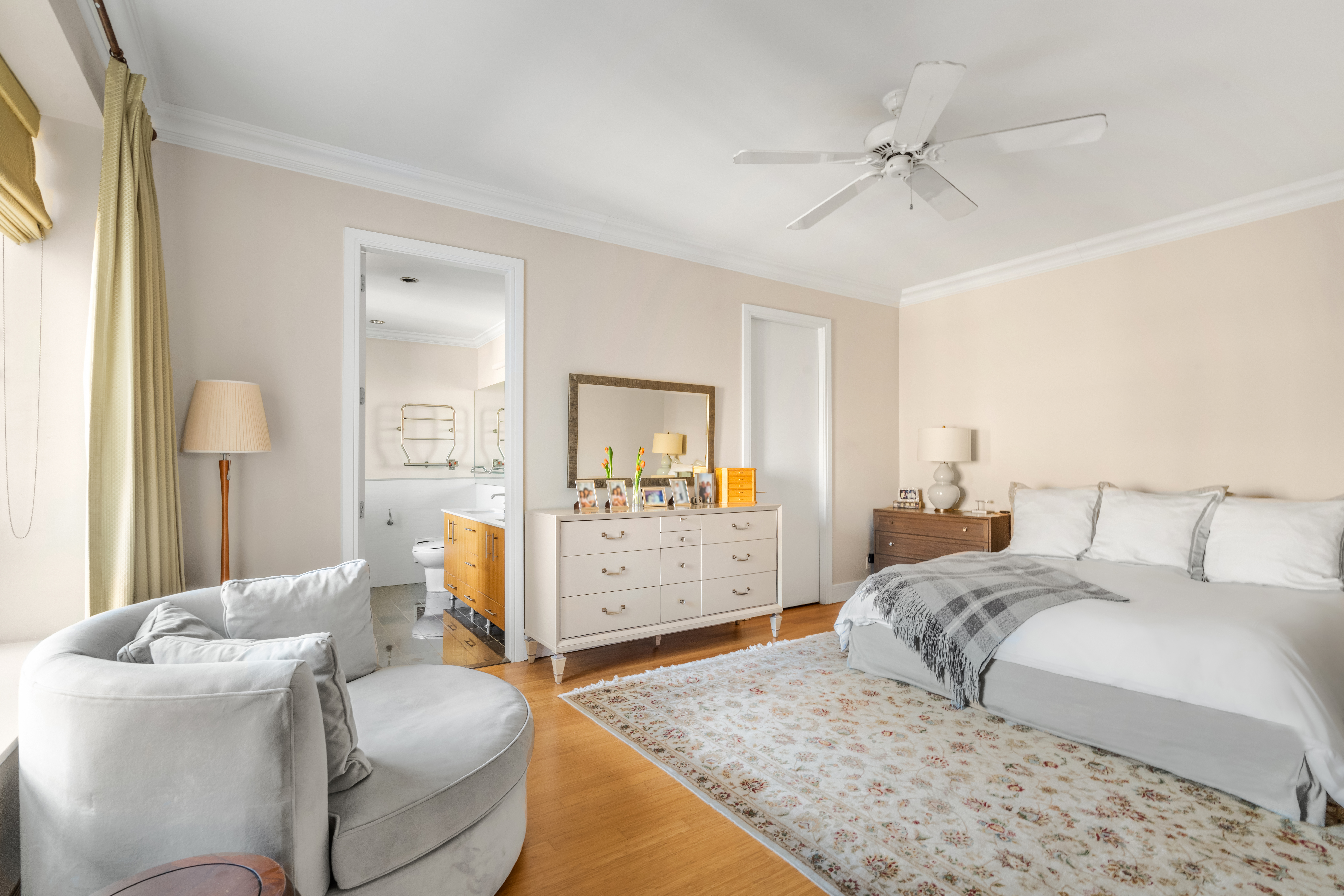 545 West 110th Street, Unit 9D Manhattan, NY 10025 - Photo 5 of 17 a bedroom with a bed and a dresser