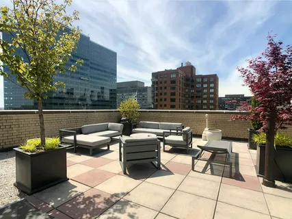 a view of a terrace with seating space